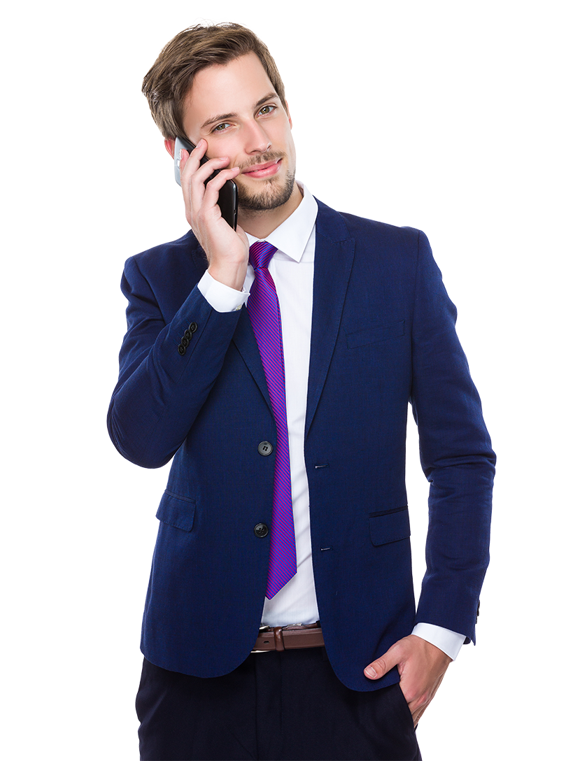 Businessman in a suit talking on a cell phone
