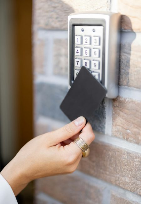 Attaching card to the electronic reader to access the office or apartment