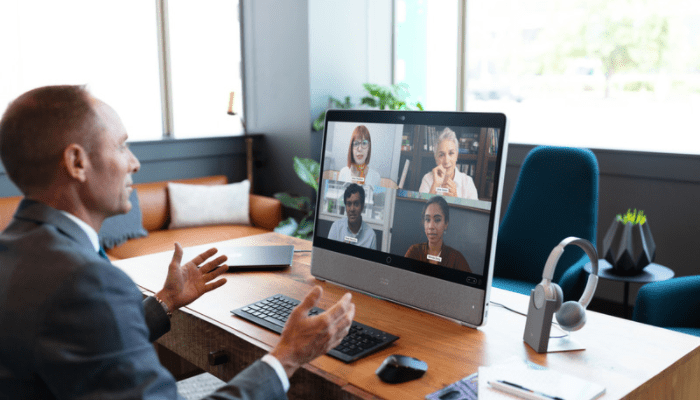 Business man having video conference on Webex collaboration suite from MCC