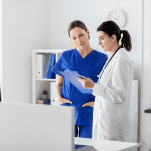 docsol healthcare image Image of a doctor and nurse examining a medical chart
